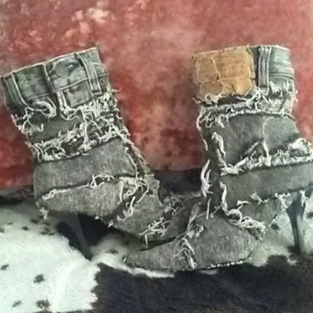 Distressed denim Levi boots